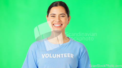 Image of Volunteer, face and happy woman on green screen in studio for community service, help and welfare. Portrait, female model and volunteering for humanitarian project, social care and support of charity