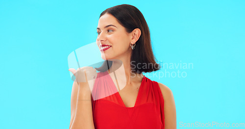 Image of Woman face, pointing and promotion with beauty and smile showing mockup for advertisement. Portrait, isolated and studio background with a happy young female point to show mock up announcement