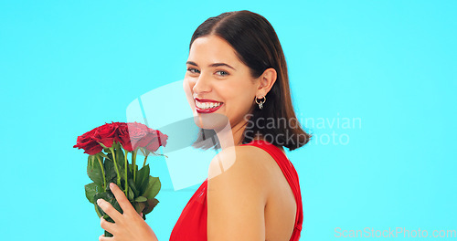 Image of Face, woman and rose bouquet in studio on blue background with fresh, floral or romantic gesture on mockup. Portrait, flower and girl with gift, present and romance, valentines or offering isolated