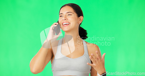 Image of Phone call, smile and excited with a woman on a green screen background in studio for communication. Mobile, contact and conversation with an attractive young female chatting against chromakey mockup