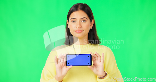 Image of Phone, green screen and dissatisfied woman isolated on studio background for website mockup and tracking marker. Wrong, fail or face of unhappy person with mobile app mock up for advertising space