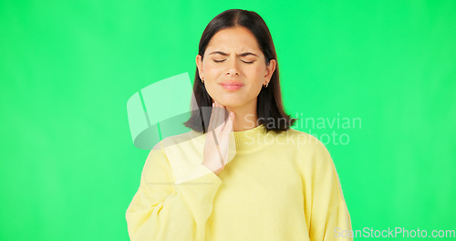 Image of Green screen, woman and pain in throat, flu infection and suffering from cold virus in studio. Sick female model, allergies and massage neck for health risk, covid and itchy voice of thyroid problem