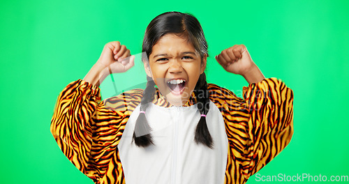 Image of Face, excited and girl cheering, green screen and happiness with joy against a studio background. Portrait, female child and young person with gesture for victory, winning and motivation with joy