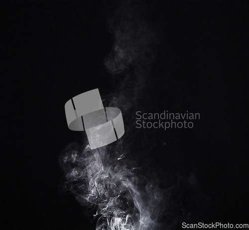 Image of Grey smoke swirl, white background and studio with no people with fog in the air. Smoking, smog and isolated with smoker art from cigarette or pollution with graphic space for incense creativity