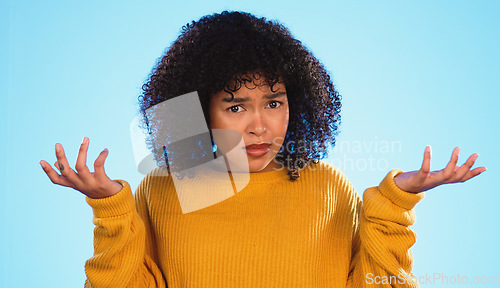 Image of Face, confused and unsure black woman in studio, pensive and dont know gesture on blue background. Doubt, portrait and girl with decision, why or emoji on mockup, product placement or isolated