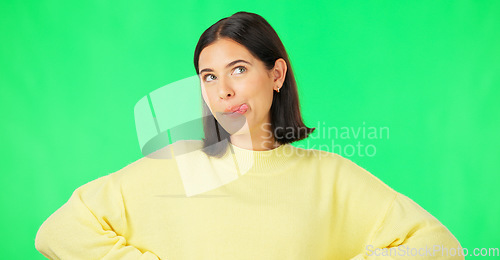 Image of Green screen, funny face expression and happy woman posing with tongue out, peace sign and carefree personality. Portrait, female model and smile in studio with emoji reactions, meme and happiness