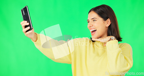 Image of Happy woman, face and selfie on green screen with peace sign and facial expressions against studio background. Silly or goofy female model smiling for photo, emoji or memory with smartphone on mockup