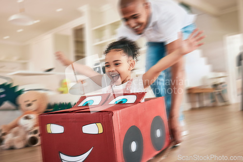 Image of Playing girl, father and box in living room for pushing, games or race in motion blur, bonding love or happiness. Man, female child or cardboard car for support, fast game and floor in family home