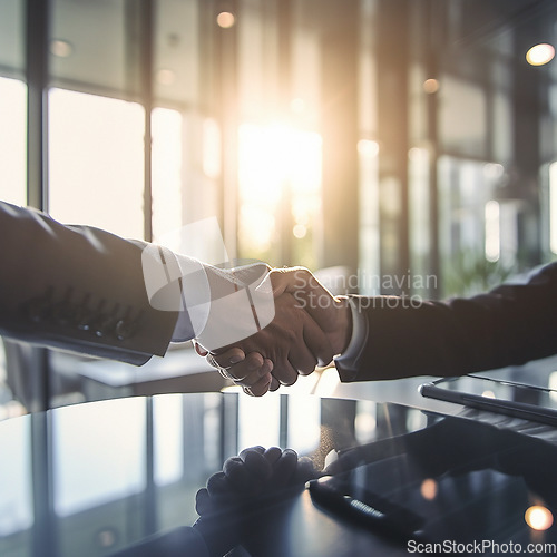 Image of Business people, shaking hands and partnership at night for b2b, agreement or recruitment at office. Employees handshake working late in team collaboration or welcome for recruit or hiring process