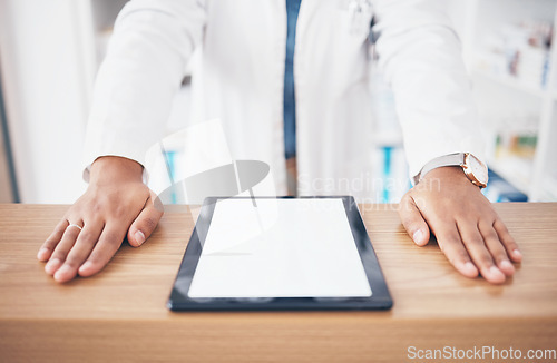 Image of Tablet, mockup or hands of woman pharmacist on table ready to help with healthcare services. Marketing space, screen or closeup of doctor by desk counter with medicine online research in drugstore