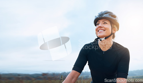 Image of Smile, fitness and woman thinking while cycling in countryside, happy and relax in nature. Contemplate, sports and lady cyclist training in Mexico for travel, vacation or cardio, routine or workout