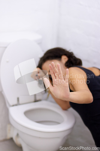 Image of Bathroom, hand and sick woman on floor suffering from anorexia, depression or anxiety. Stress, toilet and female with body dysmorphia, bulimia or an eating disorder, nausea and mental health problem