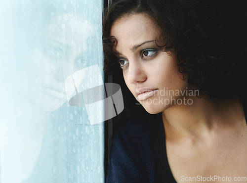 Image of Sad, rain and reflection with woman by window for depression, tired and lonely. Anxiety, mental health and exhausted with female thinking at home for broken heart, disappointed and fear mockup