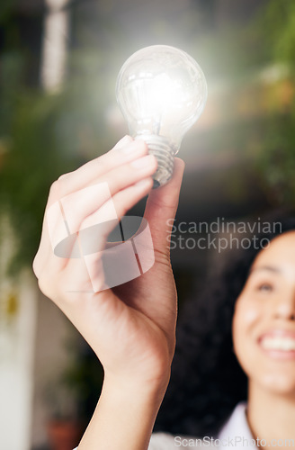 Image of Light bulb, ideas and woman with inspiration, thinking and clean energy for sustainability. Female, glow and girl with motivation, creativity and thoughts for project, inspire and creation for growth