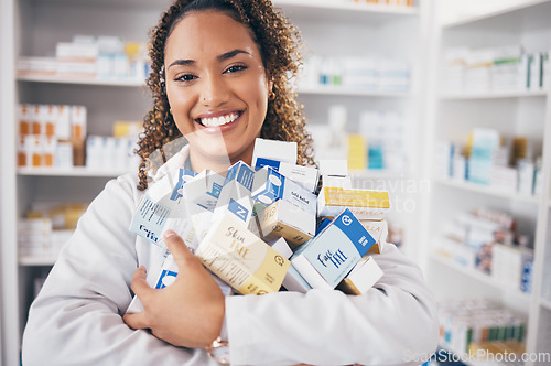 Image of Woman in portrait, pills and pharmacist in pharmacy with drugs, healthcare and medicine in drug store. Vitamins, supplements and female smile with prescription medication in pharmaceutical industry