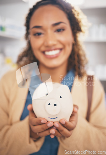 Image of Insurance, piggy bank and woman in pharmacy for medical products, medication and supplements for wellness. Healthcare, hospital and happy female with financial savings, money and payment for medicine