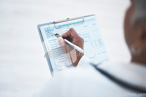 Image of Doctor, hand and clipboard for writing report in clinic with inspection, healthcare paperwork or info. Woman medic, paper and documents for identity, results or diagnosis with focus at hospital job