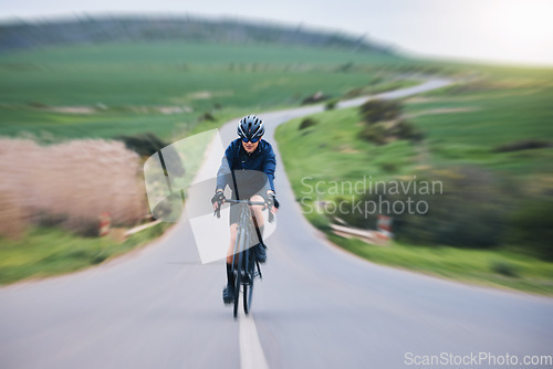 Image of Fitness, race and cycling with woman in road for training, competition or championship. Workout, sports and triathlon with female cyclist riding on bike and fast for freedom, exercise and motion blur