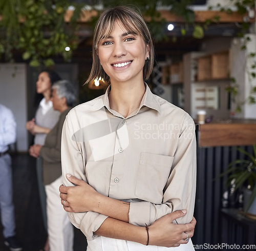 Image of Portrait, business and woman with arms crossed, smile and leadership skills in workplace. Face, female employee and manager with confidence, startup and success with company, management and happiness