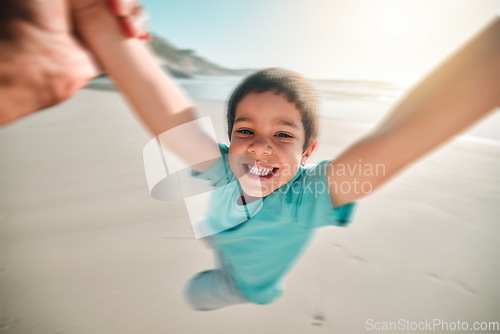 Image of Portrait, child and sea fun swing in the air with happiness and parent on summer holiday. Happy, smile and vacation of a kid with youth and swinging on the beach outdoor playing by the ocean