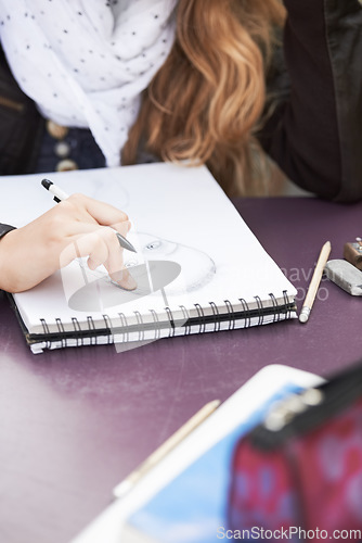 Image of Drawing, design and a woman with a notebook for school creativity, exam sketch and inspiration. College, art and a student writing or doing a doodle on paper for education and university class