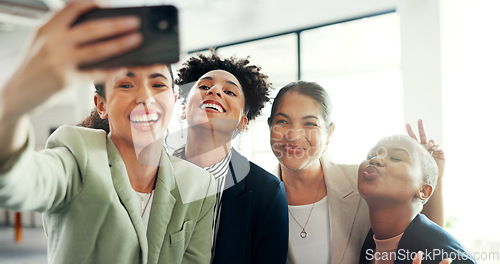 Image of Selfie, friends and diversity with woman friends posing for a profile picture together in the office at work. Social media, partnership and teamwork with female colleague group taking a photograph