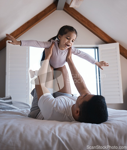 Image of Airplane, game and child with father on a bed happy, playing and bonding in the morning together. Flying, fun and excited girl with parent in a bedroom for creative, fantasy and childhood happiness