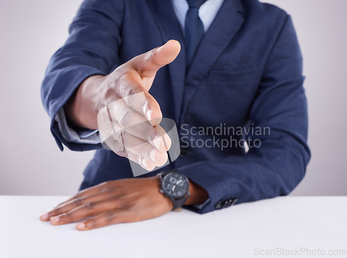 Image of Handshake, offer and closeup of man in white background for business networking, thank you and meeting HR. Corporate male stretching to shake hands in studio for recruitment, welcome and partnership