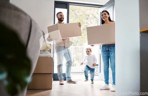 Image of Moving family, new house and carrying boxes in real estate property as happy people, child and homeowner. Move, parents walking in front door and excited with love, mortgage and apartment relocation