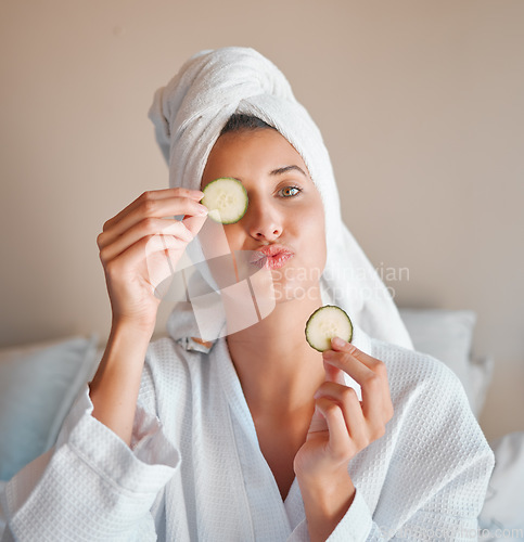 Image of Eye mask, happy and portrait of a woman with cucumber for wellness, face care and skincare at home. Playful, home spa and a girl with food for facial hydration, nutrition and weekend relaxation