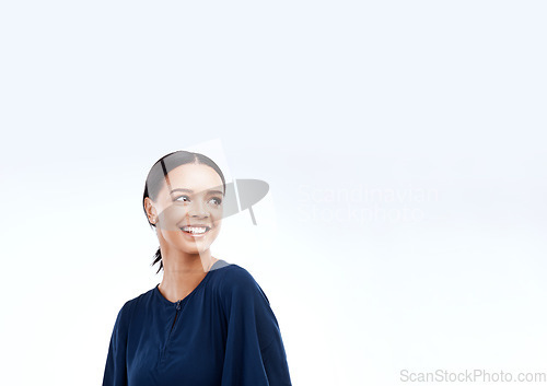 Image of Woman, smile and studio with a happy modern female looking at mockup for advertisement space. Happiness, joy and gen z female relax with youth and smiling with isolated white background and mock up