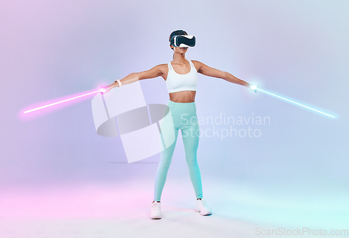 Image of Game, virtual reality glasses and woman with lightsaber, future and fun against studio background. Female player, gamer or girl with vr eyewear, fantasy game or weapon with confidence and laser saber