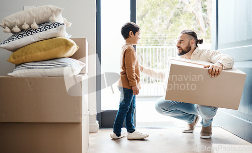 Image of Family moving, new house and box with property, father and child with real estate and home owner. Parent with mortgage, man comfort boy and happy about move, love and kindness with relocation boxes