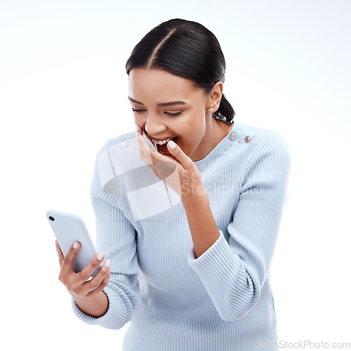 Image of Phone, reading and happy woman laughing at studio comic, social media meme or funny joke on mobile smartphone. Happiness, laugh or isolated person with comedy blog or text message on white background