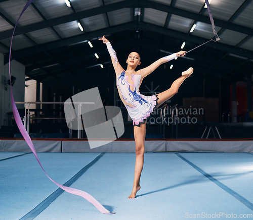 Image of Ribbon, gymnastics and portrait of woman in dancing performance, training and sports competition. Female, rhythmic movement and flexible dancer balance in action, creative talent and concert in arena