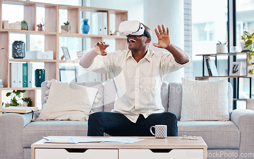 Image of Happy, man and virtual reality headset in home lounge of cyber experience, metaverse system or gaming connection. Excited black male, VR and games in living room of future innovation of ui technology