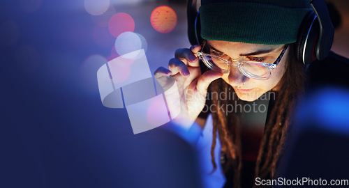 Image of Cyber security, woman or hacker working on computer in the basement at night for phishing on database. Bokeh mockup, focus or girl coder hacking ai digital network password on internet or website