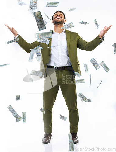 Image of Money confetti, cash and business man on studio background for investment, bonus and stock market. Finance success, winner mockup and excited male with bills for winning, profit and wealth savings