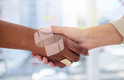 Image of Partnership, handshake and collaboration for business in office for deal, onboarding or agreement. Welcome, meeting and people or women shaking hands for introduction, thank you or congratulations.