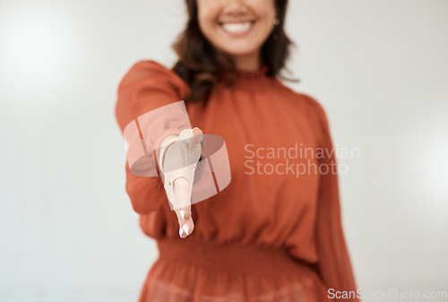 Image of Business woman, handshake and smile for meeting, greeting or recruitment hiring at the office. Hand of happy female recruiter shaking hands for thank you, welcome or deal in agreement at workplace