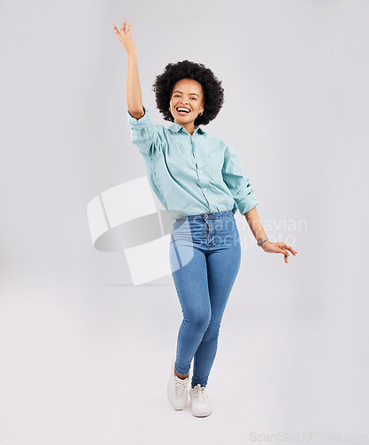 Image of Happy, dance and portrait of a black woman with style isolated on a white background in a studio. Smile, beautiful and an African girl with fashion sense, dancing and showing a pose on a backdrop