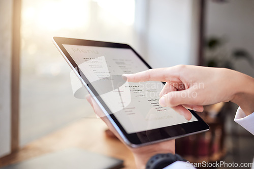 Image of Closeup person, menu and tablet in cafe for ordering food, meal and lunch on technology. Restaurant customer, hands and screen of digital options, app choice and selection list online in coffee shop