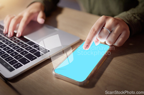 Image of Closeup, hands or phone green screen for woman in night research, internet logo branding or web design mockup in office. Blue, mock up or technology for working late person on social media mobile app