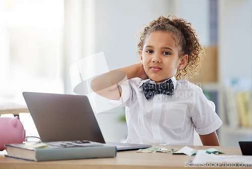 Image of Stress, portrait and child boss in the office while working with money for accounting or math. Confused, upset and face of a young girl kid ceo sitting by a desk with a laptop in a modern workplace.