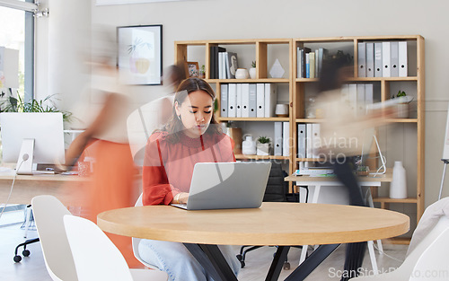 Image of Blur, business and woman with laptop, focus and deadline for new project, planning and schedule in office. Female employee, agent and manager with device, pc and technology for social media or typing