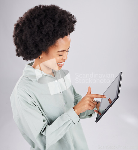 Image of Digital tablet, search and happy black woman in studio for social media, browsing and internet on grey background. Online, app and female smile while streaming, texting or reading while isolated