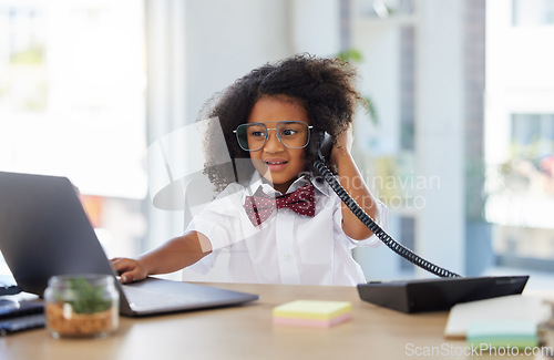 Image of Little girl, telephone and laptop in call center working or playing pretend as a sales consultant at office. Happy kid on phone call talking at consulting desk for imagination, dream job or career