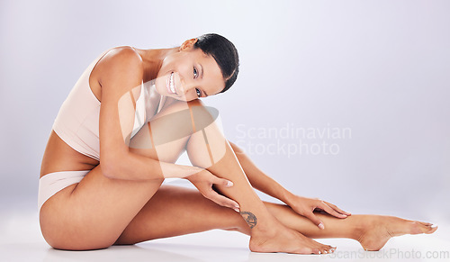 Image of Body, legs and portrait of woman for beauty and skincare in studio for healthy lifestyle. Happy female on a white background for health, wellness and epilation or shaving self care for smooth skin