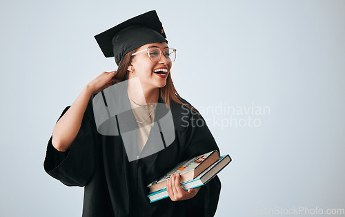 Image of Graduation cap, books and happy woman isolated on studio background education, college or scholarship success mockup. Biracial university student or graduate with reading knowledge and learning goals