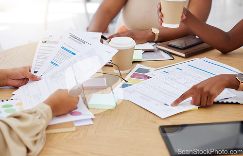 Image of Hands, paperwork and group brainstorming in office for business insurance or application form. Teamwork, coworking and professionals or people with documents in meeting for planning or discussion.